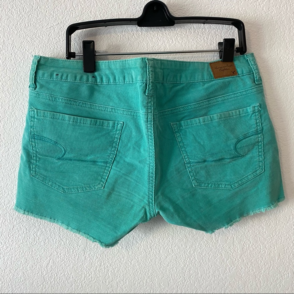 Teal corduroy shorts with rough edge